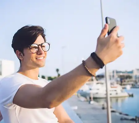 Person using a smartphone outdoors
